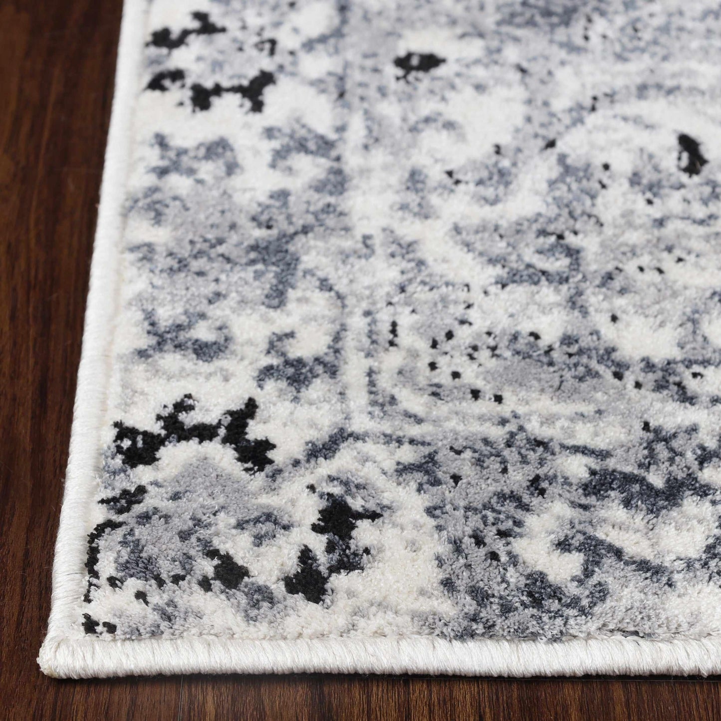 Caine Distressed Florals Modern Indoor Area Rug - Platinum